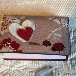 Furla mini wallet.